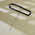 Detail of black elastic leg chain featuring silver leaf charms and metal ring accents - Silver Leaf Tassel Leg Chain
