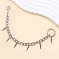 Detail of silver punk metal chain for clogs with sharp rivet studs and spring buckles - Thick Chain Style