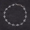 Macro shot of silver gothic cross links and spring clasps for hip hop jewelry chain - Single Layer Cross Pants Chain
