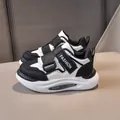 Sneakers per bambini in pelle bianca e nera con velcro e suola spessa ammortizzata - Size 21 / Nero