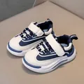 Scarpe da ginnastica in pelle blu scuro per bambini con suola bianca e chiusura in velcro - EU 21 / Blu
