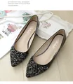 Detail of pointed toe flat shoe with sparkling black and silver rhinestones on the surface - EU 34 / Black