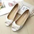 Elegant white peep-toe flat shoes featuring a large bow and soft anti-slip sole for women - EU 38 / White