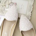 Elegant pointed-toe flat mule in beige with shimmering sequin and floral textures - EU 38 / Apricot