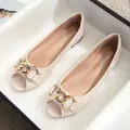 Beige open-toe flats for women featuring a stylish large golden chain ornament - EU 34 / Apricot