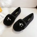 Plush black rabbit fur loafers with gold star and pearl accent for women - EU 42 / Black