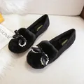 Women black flat faux fur shoes with velvet bow and pearl detail on a sofa - EU 34 / Black