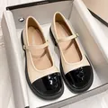 Beige and black Mary Jane block heels with strap and original box on white background - EU 34 / Apricot