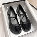 Retro black matte and patent leather Mary Jane shoes with thick heels and buckles - EU 34 / Black