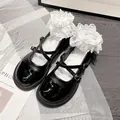 Retro black Mary Jane shoes with crisscross straps and matte leather finish - EU 34 / Black