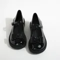 Classic black patent leather Mary Jane shoes with decorative bow and buckle strap - EU 34 / Black