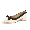 Elegant beige square toe pumps with black bow accent and comfortable block heel for women - EU 38 / Apricot