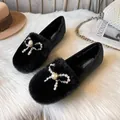 Women's warm black faux rabbit fur loafers featuring a pearl rhinestone bow decoration - EU 33 / Black