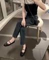 French style black round toe Mary Jane ballet flats paired with jeans and fashion accessories - EU 35 / Black