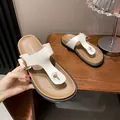 Flat thong sandals in beige pebble leather with adjustable golden buckle details - EU 35 / Cream White Lychee Grain