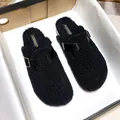 Black faux fur mule slippers with leather strap and golden buckle on cork sole - EU 35 / Black