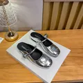 Silver Mary Jane mules with metallic finish and buckle strap on a minimalist stand - EU 35 / Silver (Mules)