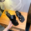 Women's black flat toe-loop sandals with stylish golden metal ring decoration - EU 35 / Black