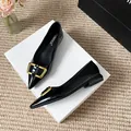 Elegant black pointed-toe patent leather flat shoes with decorative gold square buckle - EU 35 / Black