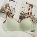 Light green ribbed wireless bra with striped elastic straps for a sporty comfort look - S / Light Green