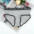Flat lay of gray ribbed cotton panties with black elastic LOVE FLIRT PEACE waistband - S / Gray