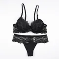 Elegant black lace lingerie set with wired push-up bra and matching thong on white back - 70B / Top And Bottom / Black