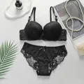 Sexy black lace lingerie set with push-up wired bra and satin lace knickers for women - Black
