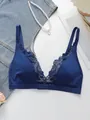 Detail of dark blue wire-free lace triangle bra with elegant floral patterns - S / Blue