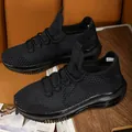 Men's black breathable fly-knit mesh running sneakers with supportive air cushion sole - 40 / Black