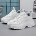 Women's white chunky platform sneakers with breathable mesh panels for athletic wear - EU 36 / White