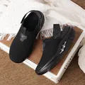 Men's black breathable mesh slip-on clogs with air cushion sole and adjustable heel strap - EU 35 / Black
