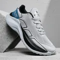 Men's grey breathable mesh running shoes with thick white soles and blue heel accents - Gray