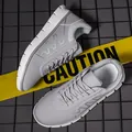 Zapatillas grises transpirables para hombre con suela blanca y cierre de cordones - EU 39 / Gris