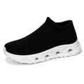Men's slip-on knit sock sneakers in black with thick cushioned white hollow soles - 36 / Black and White