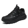 Black hiking shoes with rotary lace system and heavy-duty lugged rubber soles - 39 / Black