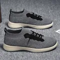 Unisex grey breathable fly-knit sneakers with white EVA sole and black accents - EU 35 / Gray