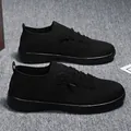 Men's casual black breathable knitted sneakers with athletic sock design and thick rubber soles - EU 35 / All Black