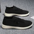 Unisex black breathable knit sneakers with thick off-white soles and slip-on sock design - EU 35 / Black and White