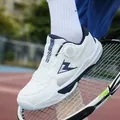 White and navy tennis shoes with rotary dial laces and breathable mesh for athletes - 36 / White Blue