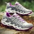 Grey and purple breathable mesh hiking shoes with drainage holes on rugged rocks - EU 36 / Light Gray
