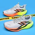 Grey marathon racing shoes with orange gradient cushioned sole and mesh upper - 34 / Fluorescent Glow
