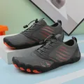 Deep grey barefoot water shoes with orange accents and quick-lace system for sports - EU 35 / Gray