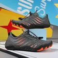 Dark grey kids water shoes with orange non-slip rubber soles and elastic laces - 26 / Grey Orange