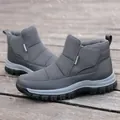 Waterproof dark grey snow boots for elderly featuring warm lining and velcro straps - EU 38 / Gray