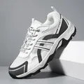 White fashionable outdoor hiking shoes with mesh panels and black sporty stripes - EU 39 / White