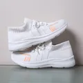 White platform sneakers for women with breathable mesh and orange-gray accents - 35 / White