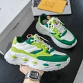 Green and white chunky low-top sneakers for men featuring thick wavy platform soles - EU 39 / White Green