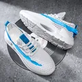 Men's white mesh breathable running shoe with blue accents and chunky sole - EU 39 / White Blue
