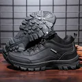 All black men's outdoor hiking boots with heavy-duty rubber sole and lace-up design - EU 39 / Black