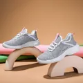 Breathable gray and white mesh running shoe with pink details and thick wave sole - EU 36 / Gray